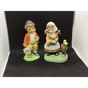 Set of 2 Boy and Girl Porcelain Figurine